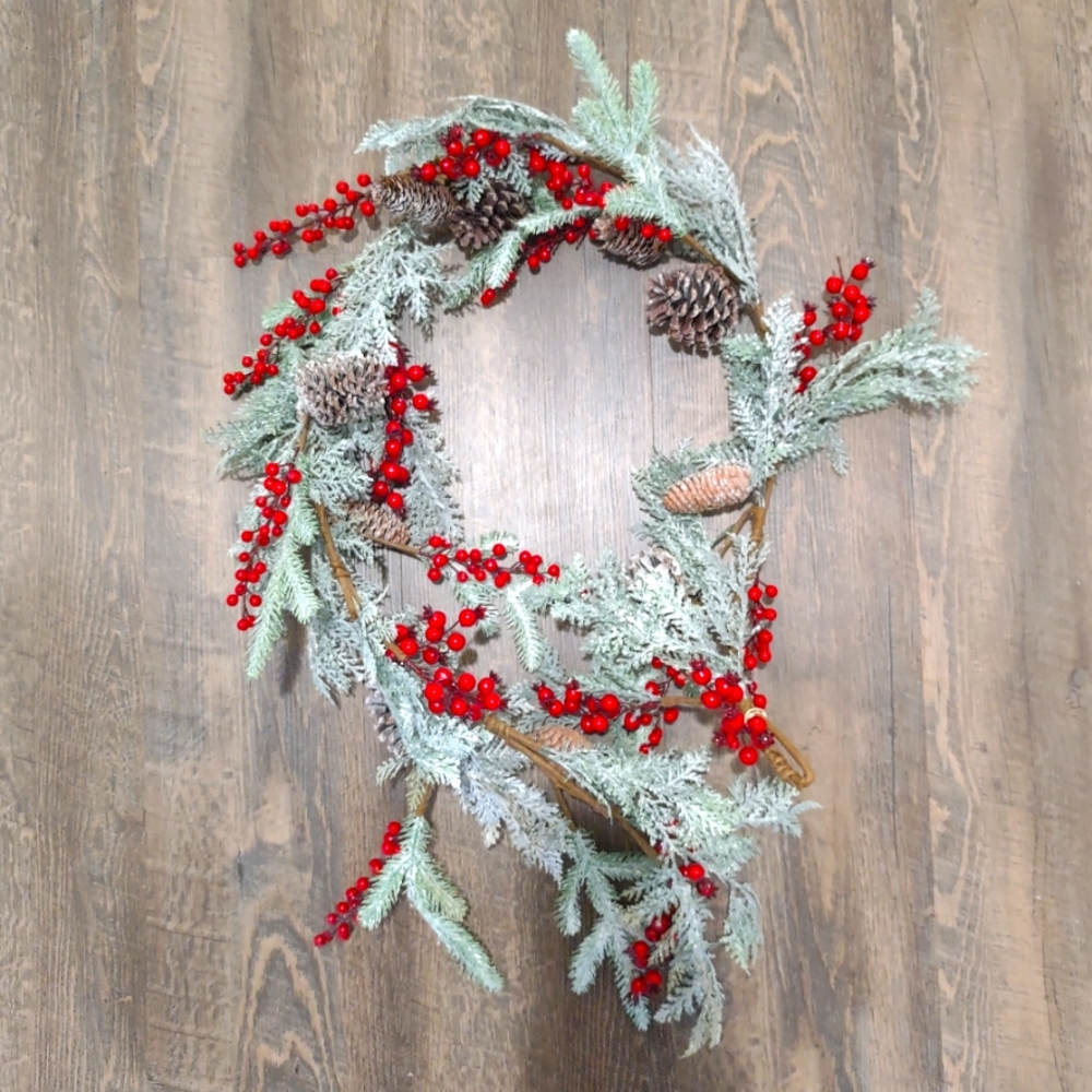 Holiday foliage table runner - pine branches, pine cones, and festive holly